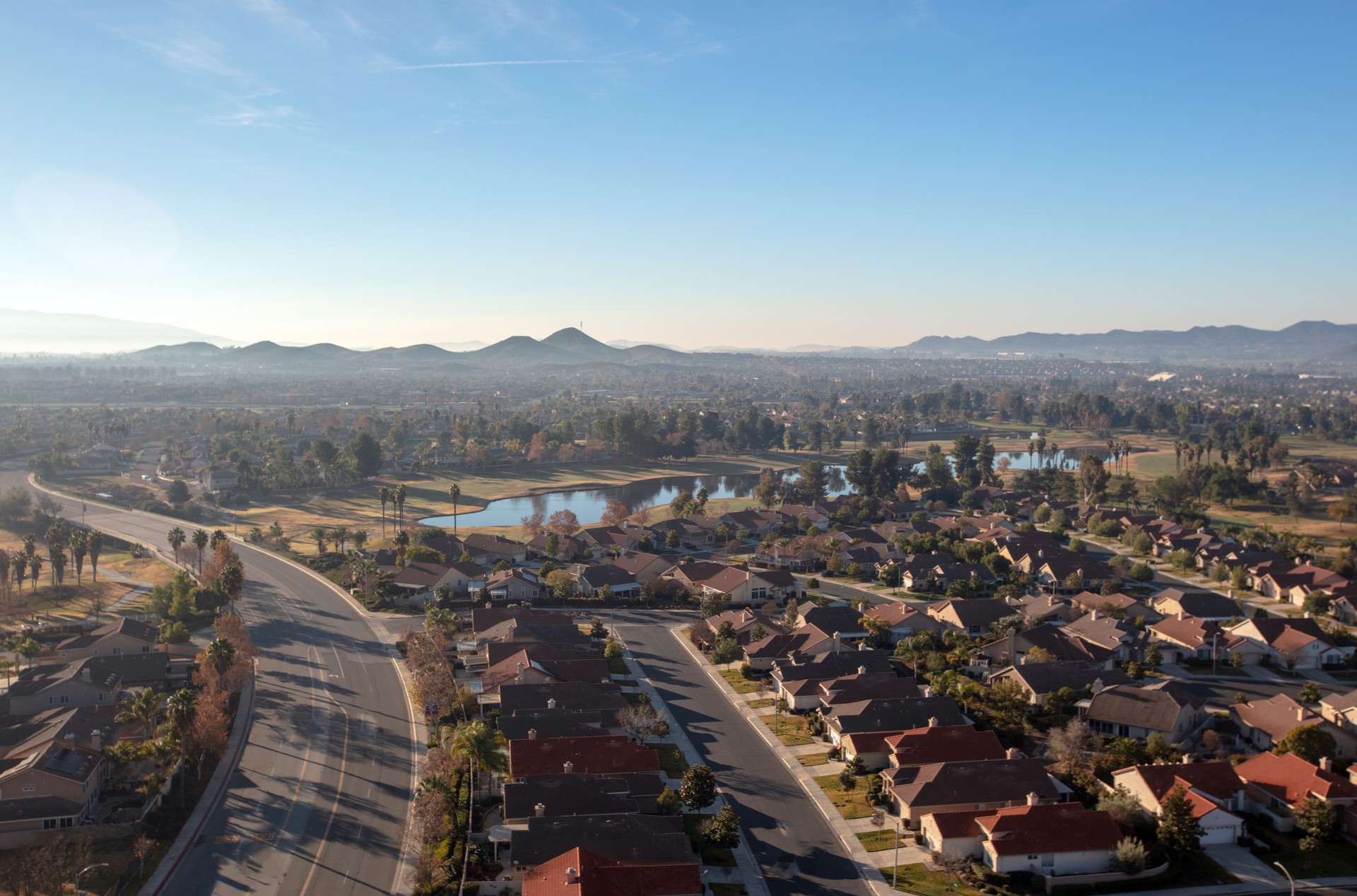 Daytime aerial view from hot air balloon of housing in Menifee southern California United States