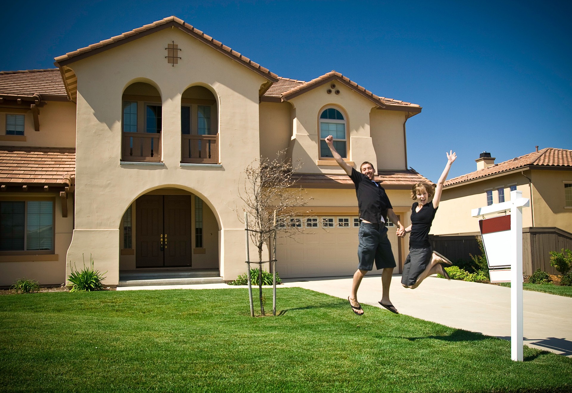 Young Couple New Home Celebration